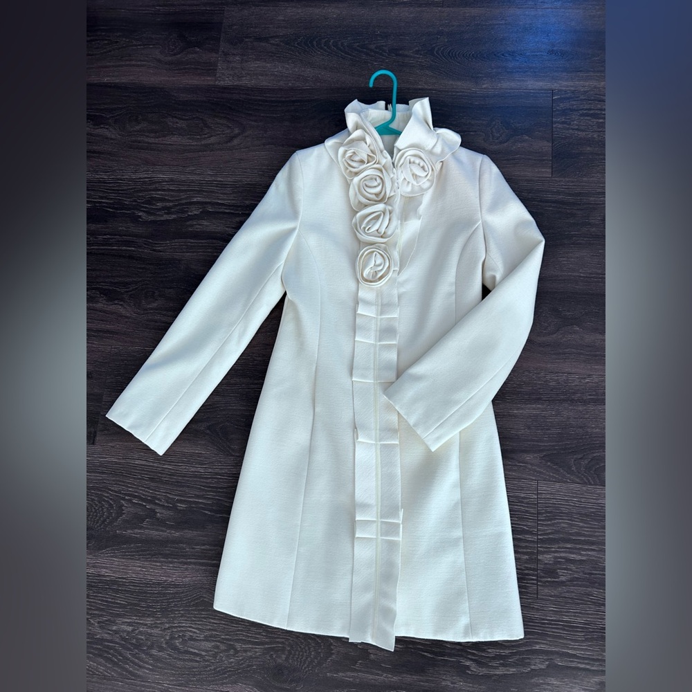 Elegant White Coat with Floral Accents